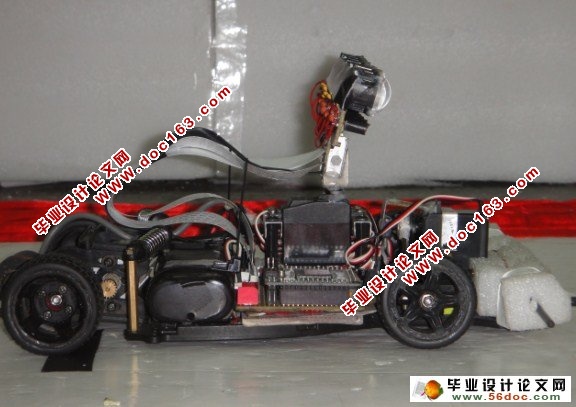基于激光传感器的智能车系统设计(单驱动寻白线)(CAD,程序,电路图)
